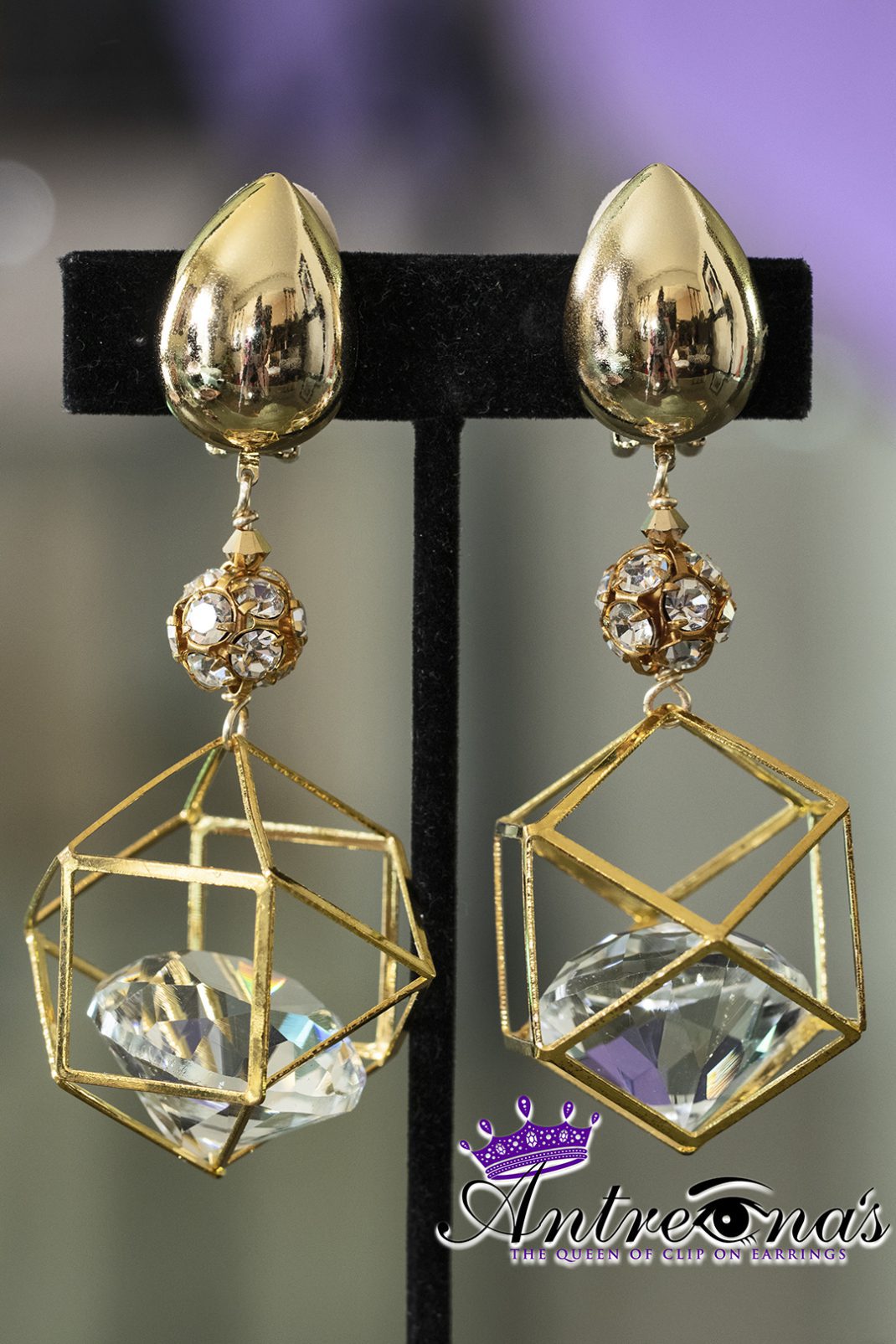 Dangle gold clip on earrings
